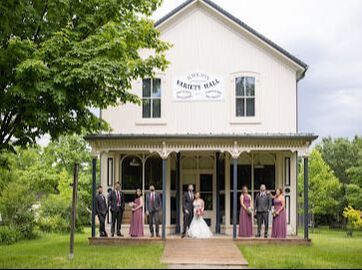 Wedding party in front of a building in Wismer Commons, Markham, Ontario